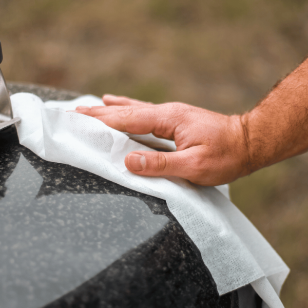 Crocodile Cloth cleaning a grill.